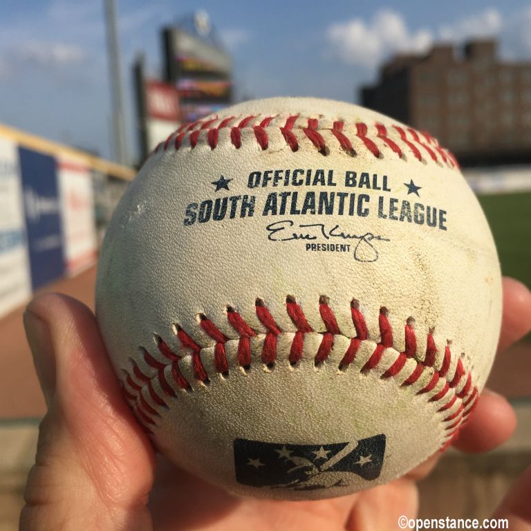 BP was still going on when I got in, which is unusual in MiLB. Got to LF just as it ended. The lone ball hawk walked past me and I asked him how he did. “I caught one, they gave me one, and I found 2.” I said, “That’s a good day,” and he agreed. He took a couple of steps, then asked me if I wanted one. Tres cool! 